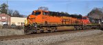 BNSF 6811 ES44C4 leads CN 2577 C44-9W and NS 8713 C40-8 with an NS unit grain train westbound through Mableton Ga 3:34PM 01-10-2015